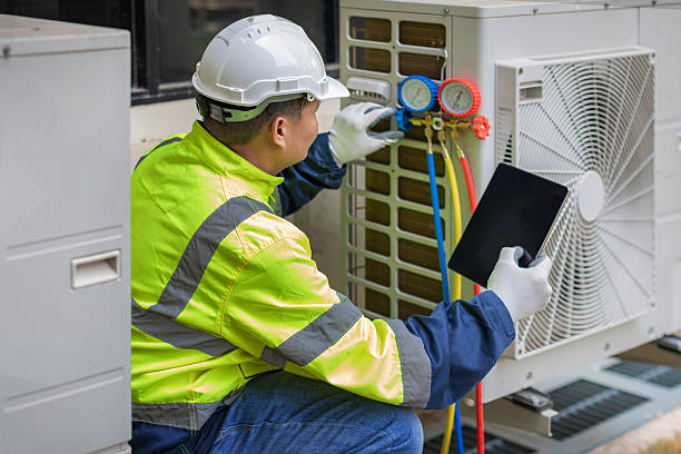 Professional Emergency Ac Repair technician working in Lockhart, TX